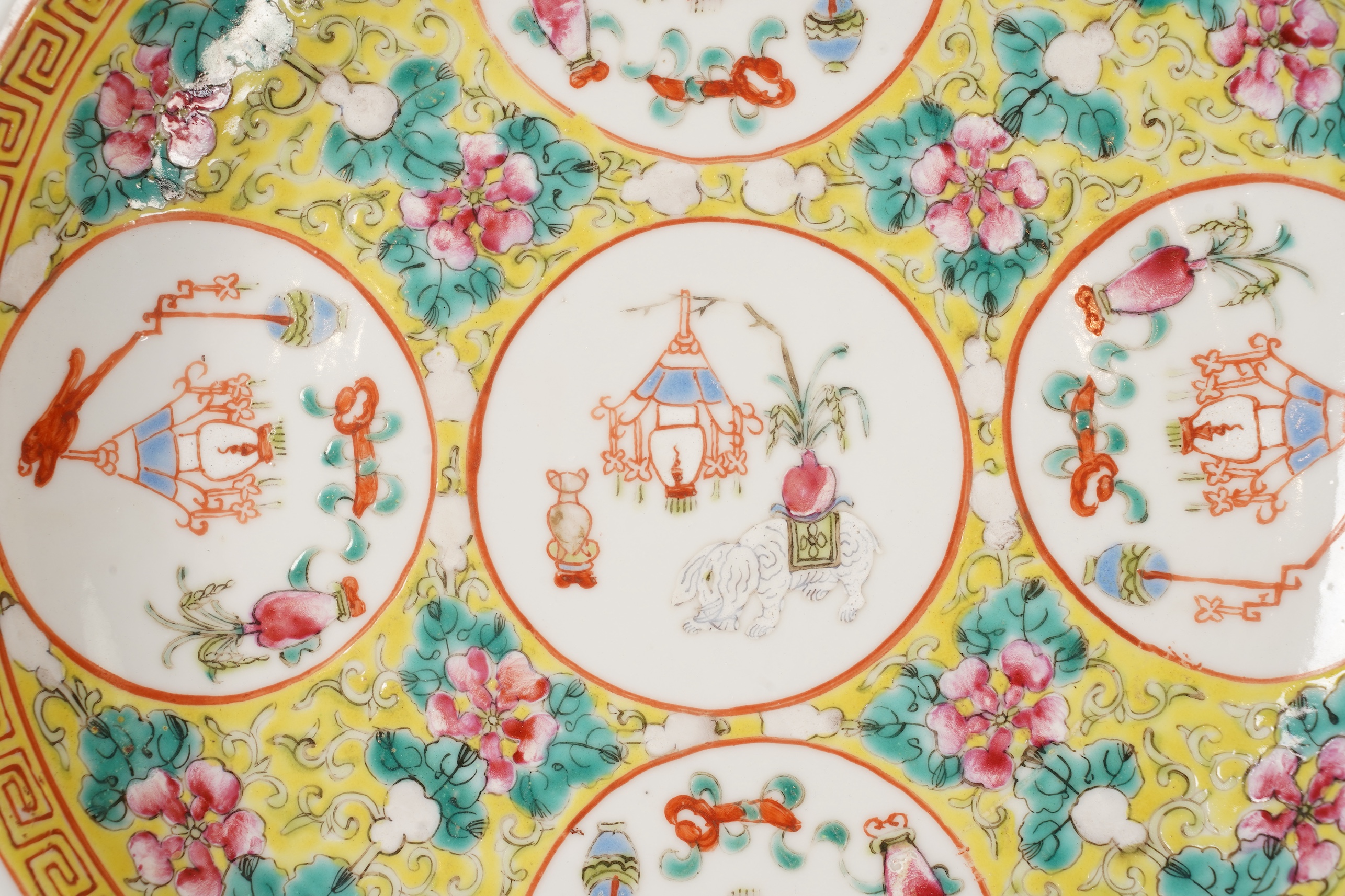 A pair of Chinese yellow ground medallion saucer dishes, Guangxu six character marks, early 20th century